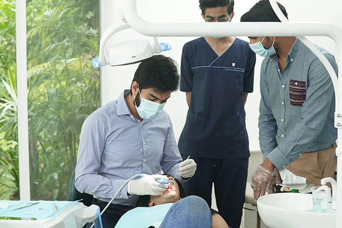 The dental team carrying out a procedure