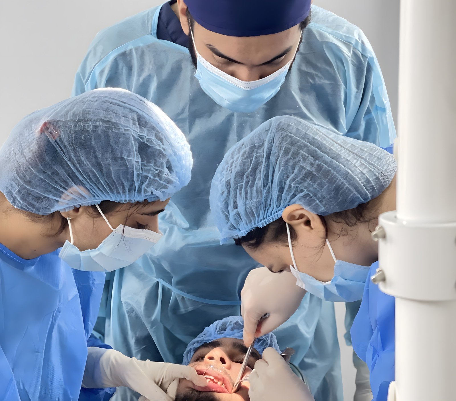 The clinical team at La Dental Aésthetique performing a procedure