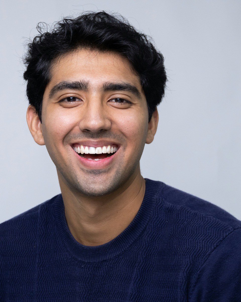 Illustrative photograph of a smiling man